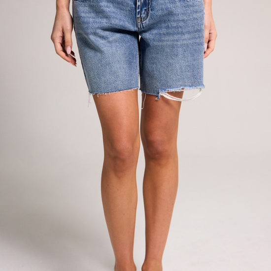 Stylish Belle's Baggy Bermuda Short - Medium Indigo, crafted from 100% cotton for comfort and trend.